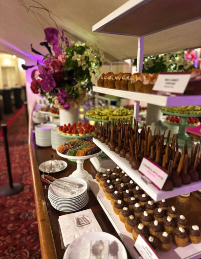 tiered dessert bar with a variety of sweets and candy